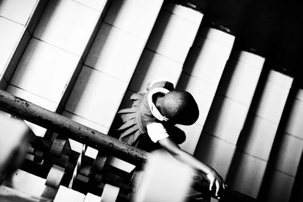 YOUNG GIRL ON SCHOOL STAIRCASE